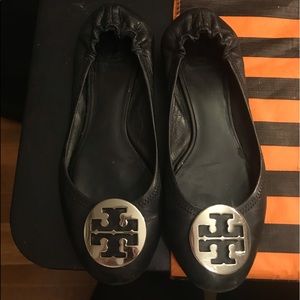 Worn Tory Burch flats